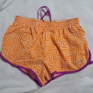 Nike Dri-Fit Shorts Women’s Size‎ Small Orange Purple Lined Running Athletic